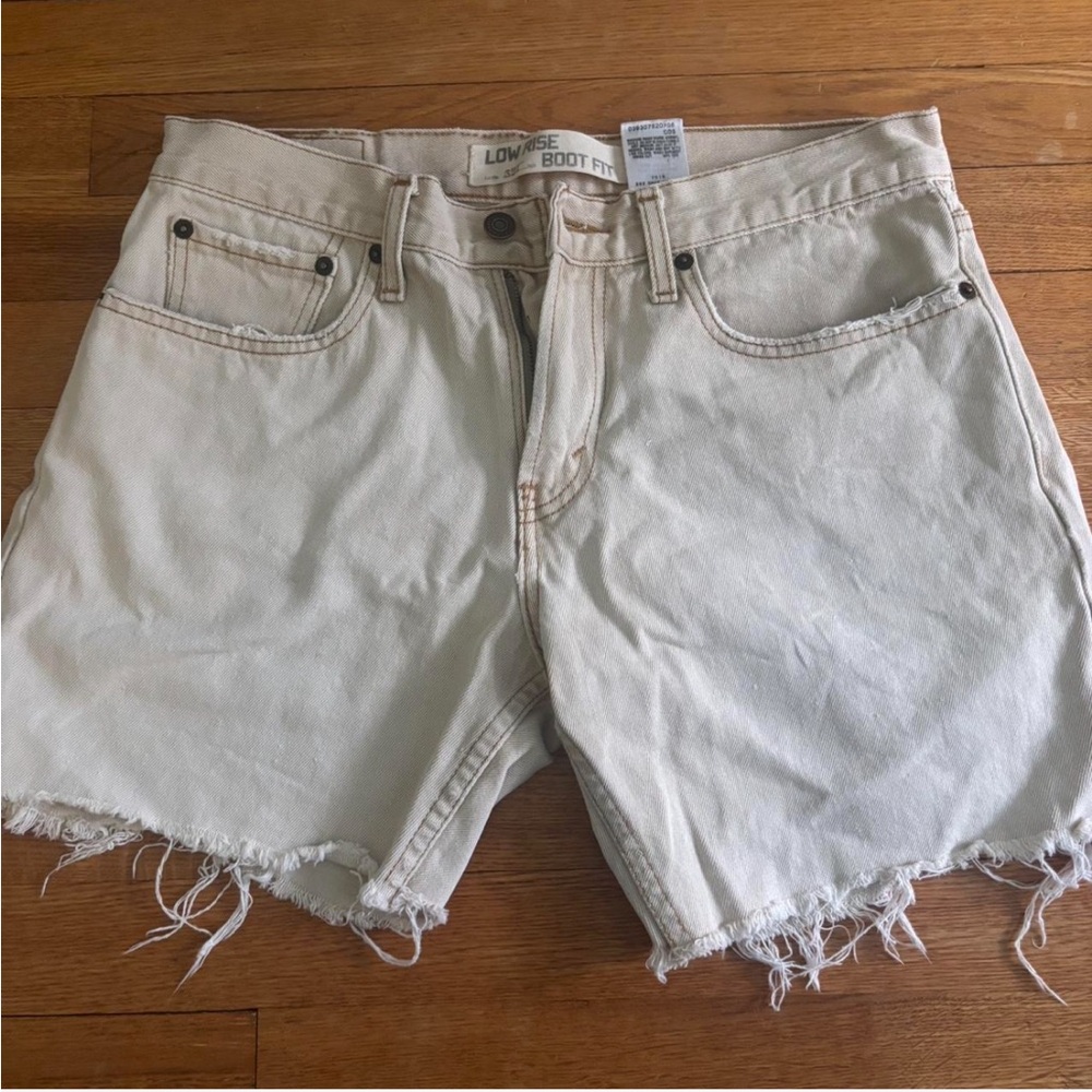 Levi's Beige Distressed Denim Shorts